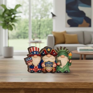 May include: A set of three ceramic mugs with a speckled, matte finish. The mugs are in shades of cream, light gray, and dark gray. Each mug has a simple, minimalist design, perfect for coffee or tea.