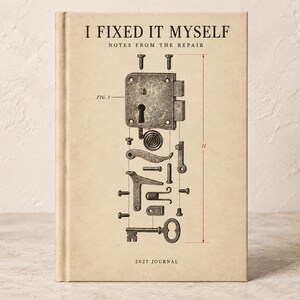 May include: A beige hardcover journal with the text I FIXED IT MYSELF NOTES FROM THE REPAIR and 2027 JOURNAL. The cover features a detailed black technical illustration of a disassembled door lock mechanism with various metal parts and a key.