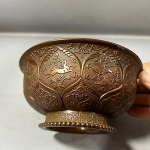Antique bronze zodiac bowl