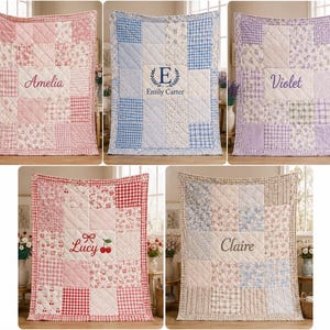 May include: Five rectangular patchwork quilts featuring various fabric patterns including floral, gingham, and stripes. Each quilt is personalized with embroidered names such as Amelia, Emily Carter, Violet, Lucy, and Claire in the center panel.