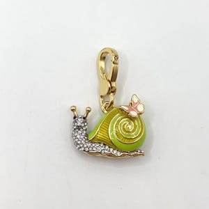J04-breloque escargot Juicy Couture