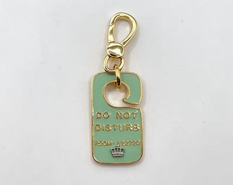 Q11-Juicy Couture do not disturb charm