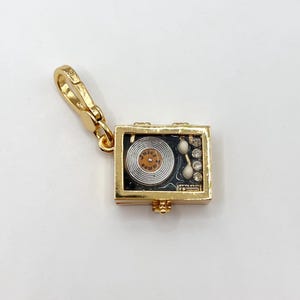 X08-Dije para tocadiscos Juicy Couture