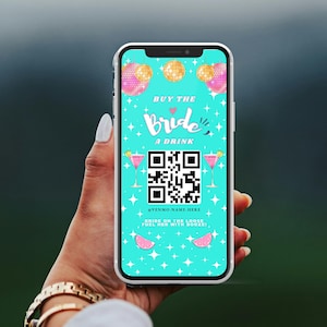 May include: A smartphone displays a teal graphic with the text "Buy the Bride a Drink" and a QR code. Pink disco ball and cocktail graphics decorate the screen. The phrase "Bride on the loose, fuel her with booze!" is also visible.