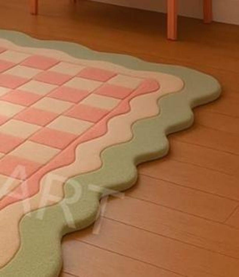 Aesthetic checkerboard area rug placed near sofa in stylish room