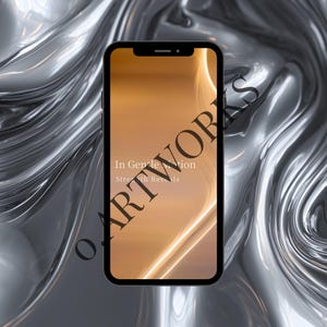 May include: A black smartphone displays a golden-toned abstract design with the text "In Gentle Motion, Strength Reveals." The phone is set against a rippled, metallic silver background, with the word "ARTWORKS" printed vertically.