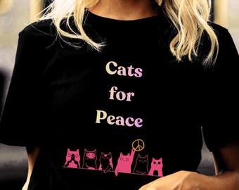 Cats for Peace progressive tee shirt. Short sleeved 100% cotton casual shirt. Unisex women men T-shirt. Colorful sustainable art clothing.