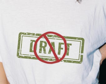 No draft anti war peace protest tee. Short sleeve 100% cotton classic casual unisex shirt. Colorful sustainable progressive political tshirt