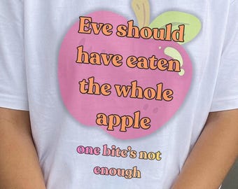 Eve's Apple T-shirt. Fun empowering message. Short sleeved 100% heavy cotton casual shirt. Unisex women men. Colorful sustainable clothing.