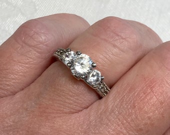 925 Sterling Silver & CZ Trilogy Engagement Ring. Nice Quality and Condition! NV Size 5