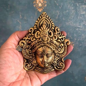 Brass Durga Face wall hanging . Small Size