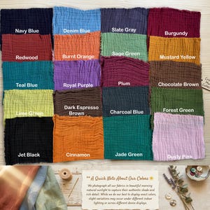 May include: A collection of twenty square fabric swatches in various colors including Navy Blue, Denim Blue, Slate Gray, Burgundy, Redwood, Burnt Orange, Sage Green, Mustard Yellow, Teal Blue, Royal Purple, Plum, Chocolate Brown, Lime Green, Dark Espresso Brown, Charcoal Blue, Forest Green, Jet Black, Cinnamon, Jade Green, and Dusty Pink, labeled Crinkled Muslin Collection.