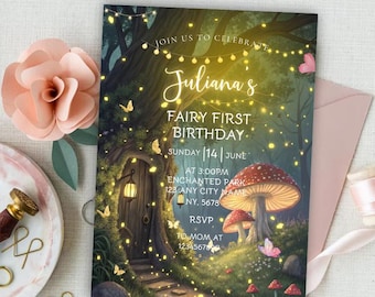 May include: A whimsical fairy-themed birthday invitation with the text "Juliana's Fairy First Birthday." The invitation features a fantasy forest scene with a mushroom, fairy lights, and a fairy door. A pink paper flower and envelope are also visible.