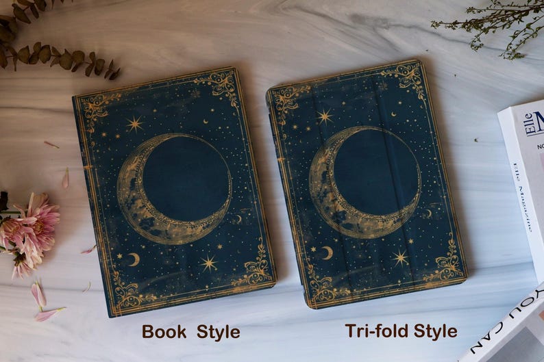 May include: Two dark blue book-style and tri-fold style cases with a celestial design. The cases feature a gold crescent moon and stars on the cover, with the words "Book Style" and "Tri-fold Style" in white text.