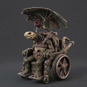 May include: A detailed sculpture of a creature with a skull-like head, seated in a vintage wheelchair. The creature is adorned with a tattered umbrella and a cluster of red, organic-looking elements. The wheelchair has intricate metalwork and spoked wheels.