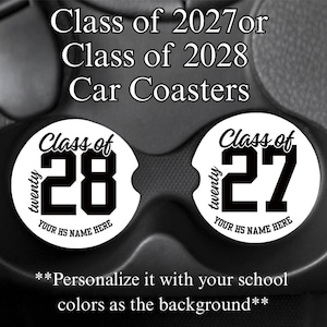 May include: White car coasters with black text. One coaster reads "Class of 28" and the other reads "Class of 27". Both have "twenty" and "YOUR HS NAME HERE" printed on them. The text "Class of 2027 or Class of 2028 Car Coasters" is printed above.