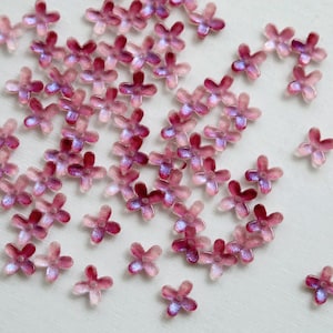 20pcs Tiny Flower Beads. aurora purple red 4 petals glass flower beads. mini glass flower bead