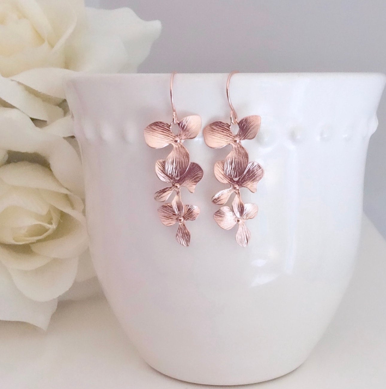Pure rose deals gold earrings