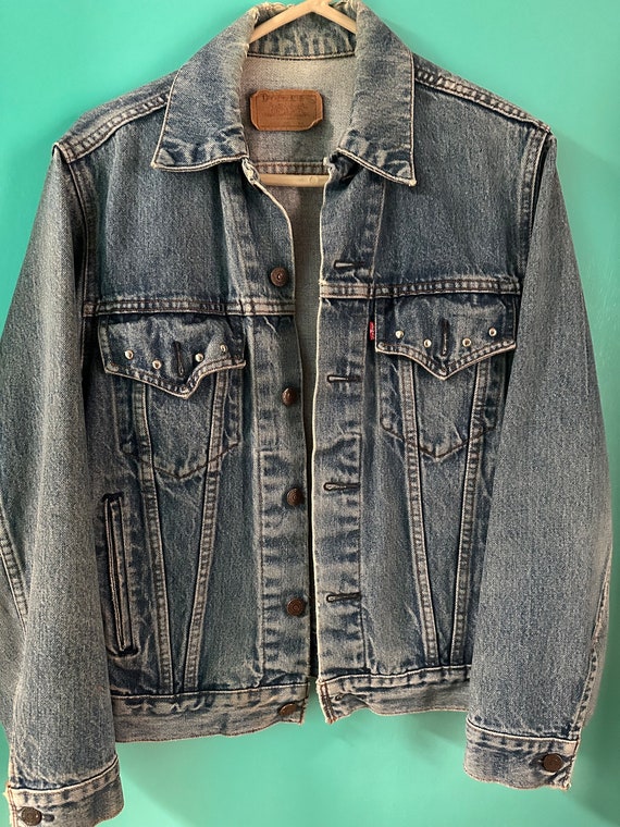 Vintage women’s Levi denim jacket size large With 