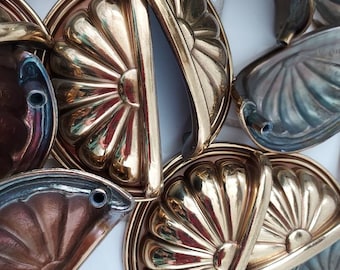 Brass shell fan style drawer pulls 4 dollars each.   See description