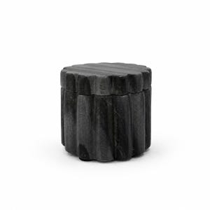 May include: A dark gray stone container with a cylindrical shape and a scalloped, fluted exterior surface. The object features a matching removable lid that sits flush with the vertical, grooved sides, creating a uniform and textured appearance.