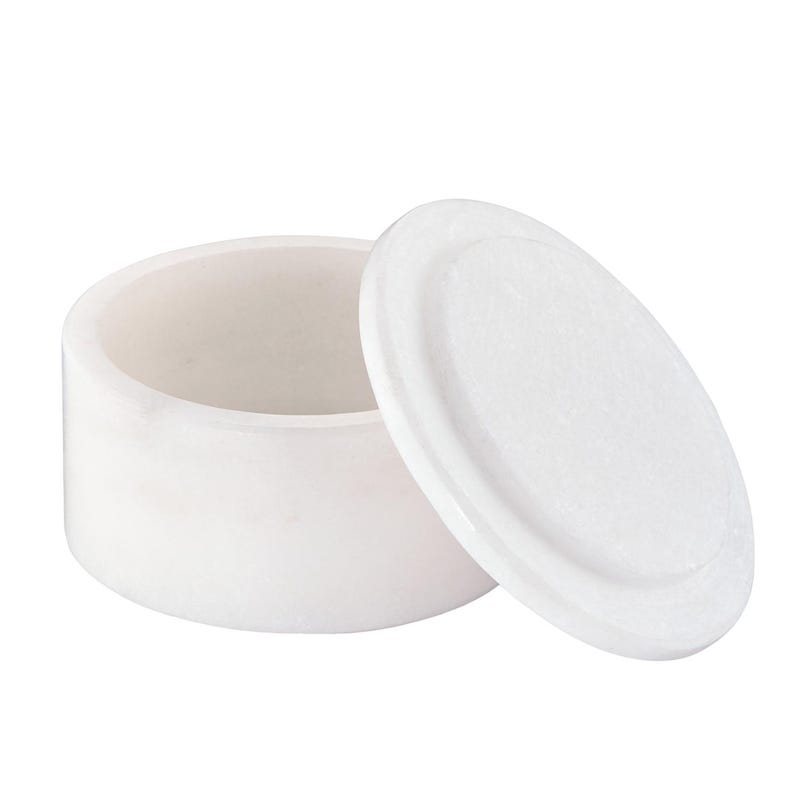 May include: A cylindrical white stone container with a smooth finish and a matching circular lid placed beside it. The container features a hollow interior and a flat base, showcasing the natural texture and solid construction of the white stone material.