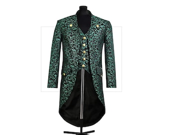 May include: A green and black patterned tailcoat with gold buttons and a matching vest. The formal jacket is displayed on a black mannequin, showcasing its intricate design and tailored fit. The coat features a long, split back.
