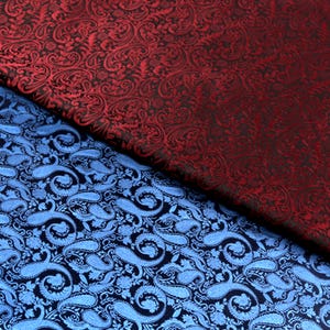 Venta al por mayor. Jacquard azul/rojo oscuro con estampado de anacardos para vestidos de cosplay de boda.