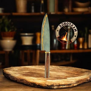 May include: A handcrafted chef's knife with a wooden handle and a blade featuring a unique gold and green pattern. The knife is displayed on a wooden cutting board. A circular logo with the text "MAXFORCE" is visible.