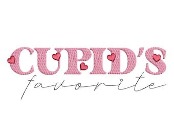 May include: Pink embroidered text that reads "CUPID'S favorite" with small red hearts. The word "CUPID'S" is in a larger, stylized font, while "favorite" is in a cursive script. The design is on a white background.