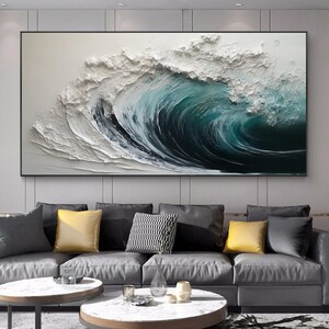 This Hand-painted 3D Textured Ocean Waves Painting captures the dynamic beauty of the sea with abstract impasto white waves. Its bold texture and calming hues create a stunning focal point, perfect for living room or coastal-inspired home décor. A true original seascape wall art piece.