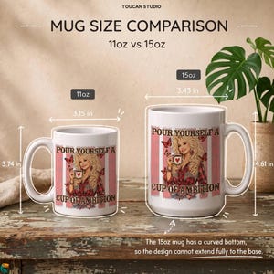 May include: Two white ceramic mugs labeled 11oz and 15oz with a graphic of a blonde woman and butterflies. The 11oz mug measures 3.15 inches wide by 3.74 inches high. The 15oz mug measures 3.43 inches wide by 4.61 inches high, featuring a curved bottom.
