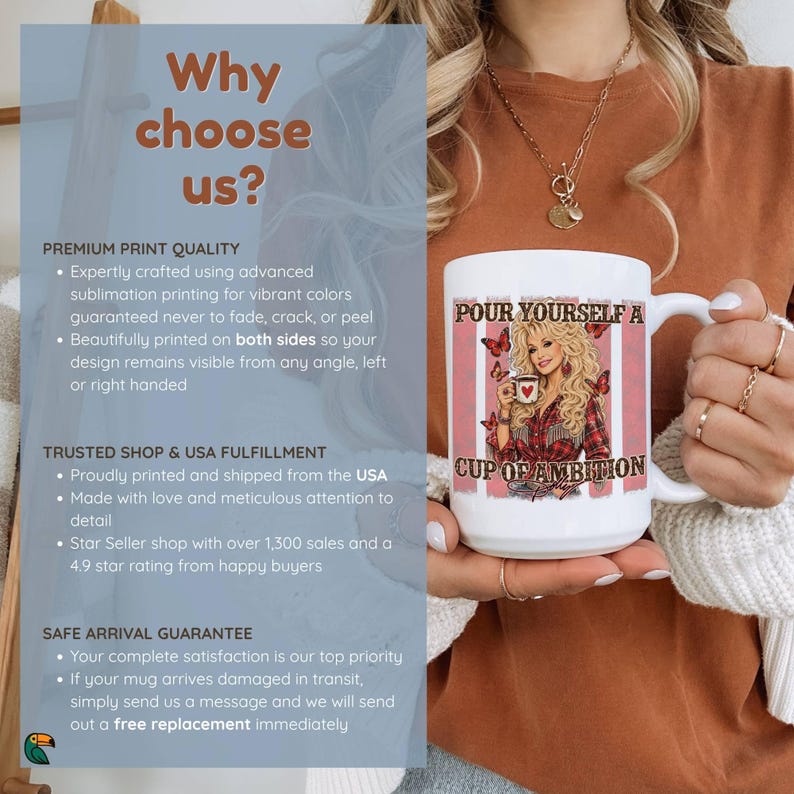 May include: A white ceramic mug featuring a graphic of a blonde woman in a red plaid shirt holding a mug, surrounded by butterflies and pink stripes. The text reads, "POUR YOURSELF A CUP OF AMBITION" in a bold, dark brown, stylized font.