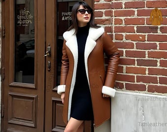 Chaqueta de piel de oveja con forro de piel de oveja y capucha de piel blanca