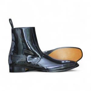 Sole View: Durable leather sole offering excellent traction and stability for all-day comfort.