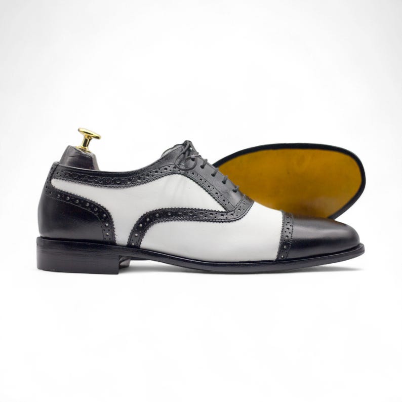 Durable leather sole providing grip and stability for long hours of wear, ideal for business and formal settings.