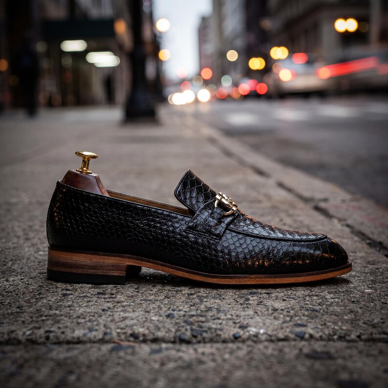 Black python effect leather shoes with metal hardware buckle