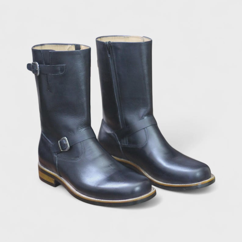 Front View – Handmade Men’s Black Python Print Engineer Boots with buckle detailing and a full-length side zipper for a sleek, stylish look.
