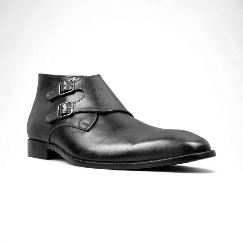 Detailed close-up of stitching and leather finish, showcasing fine craftsmanship and quality.