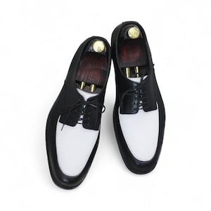 Rear view showcasing polished craftsmanship and sleek heel design.