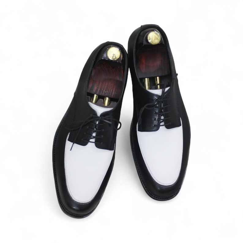 Rear view showcasing polished craftsmanship and sleek heel design.