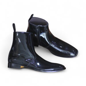 Heel View: Rear view showcasing polished craftsmanship and sleek heel design.