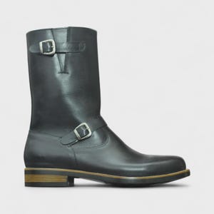 Close-Up of Leather – Close-up of black leather with python print on Handmade Engineer Boots, emphasizing premium quality and texture.