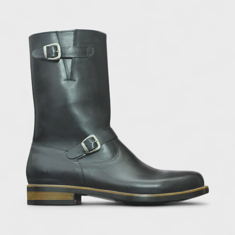 Close-Up of Leather – Close-up of black leather with python print on Handmade Engineer Boots, emphasizing premium quality and texture.