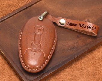 Funda para llaves de cuero genuino personalizada y hecha a mano, adecuada para la motocicleta Vespa GTS300 de nuevo estilo.