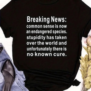 Black &quot;Breaking News&quot; T Shirt for Men and Women
