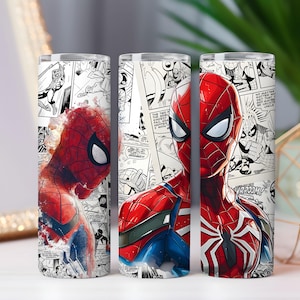 May include: Three stainless steel tumblers featuring Spider-Man. The tumblers showcase the superhero in his iconic red and blue suit, set against a backdrop of comic book panels in black and white. The design includes action poses and close-up portraits.