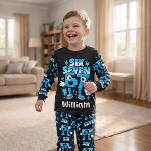 May include: Black long-sleeved pajama set with the text "SIX SEVEN" in blue and white, and the name "William" in white. The design features cartoon-like blue numbers and accents. The pajama pants have a repeating pattern of the same design.