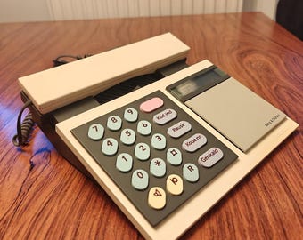 Radio Beocom 2000 retro color crema de los años 80.