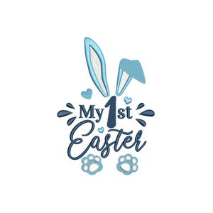 May include: An embroidered design with the text "My 1st Easter" in navy blue script. The design includes blue bunny ears, hearts, paw prints, and decorative elements, perfect for Easter celebrations.